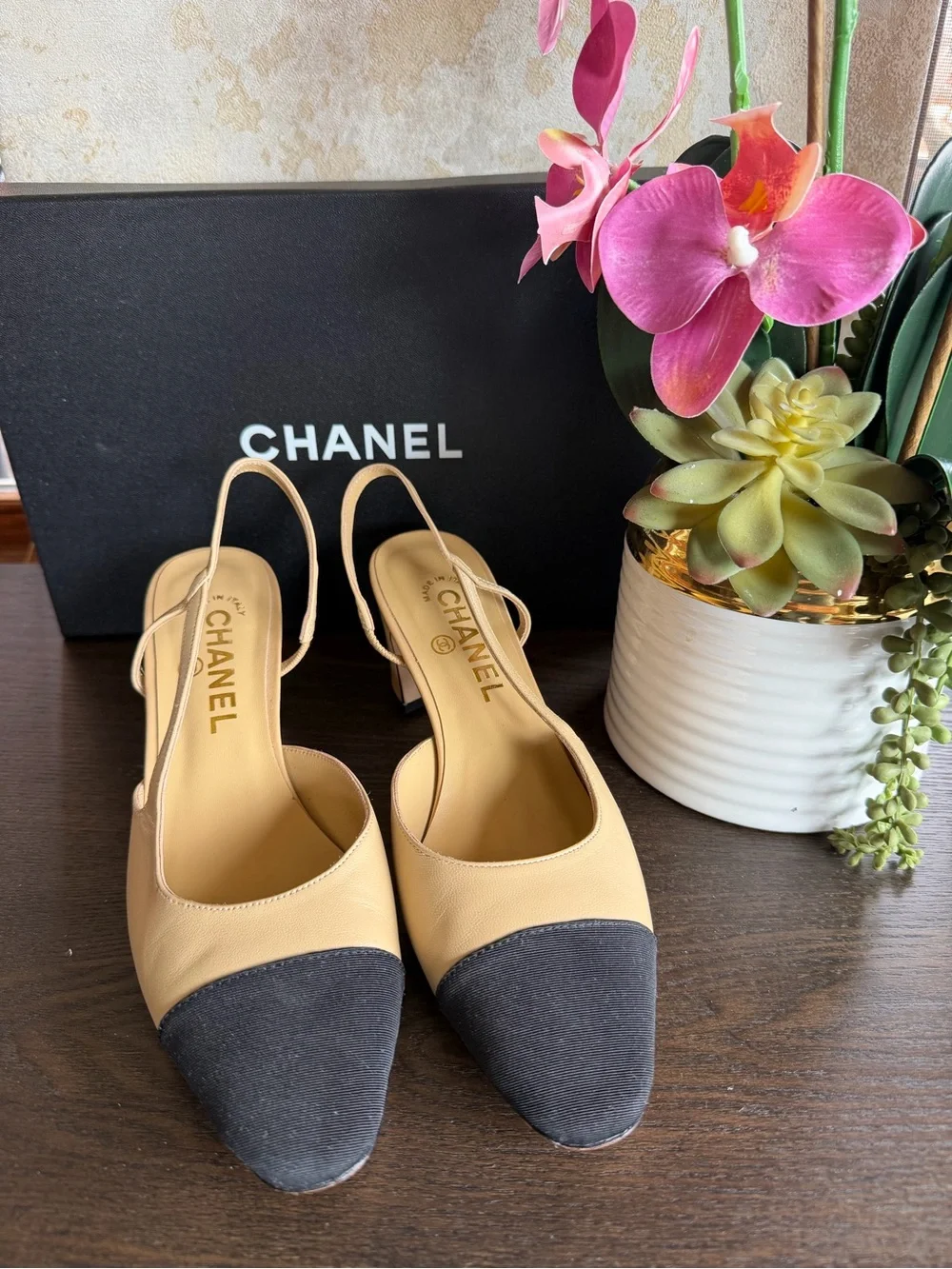 CHANEL Beige Leather Slingback Pumps with Black Cap Toe